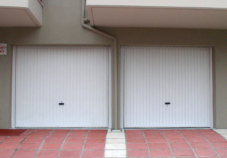 Ρολά Γκαραζόπορτες στο Περιστέρι : Α. & Σ. Μενούνος Ρολό Γκαραζόπορτα, Βιομηχανικές Πόρτες, Δικτυωτά Ρολά, Συρόμενες – Ανοιγόμενες Πόρτες, Γκαραζόπορτες Οροφής, Ρολά Αλουμινίου, Μηχανισμοί Οροφής, Μπάρες Στάθμευσης, Αυτοματισμοί, Φωτοκύτταρα Ασφαλείας, Πτυσσόμενες Πόρτες.